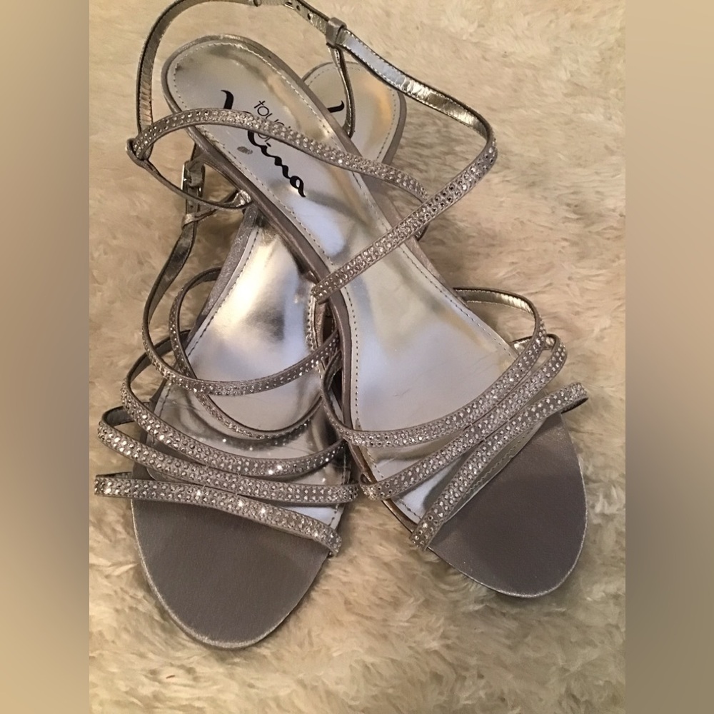 Women’s size 9.5 touch of Nina silver sandals  2 1/2 inch heels